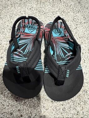 Reef Kids Black Flip Sandals with Teal & Coral Palm Print